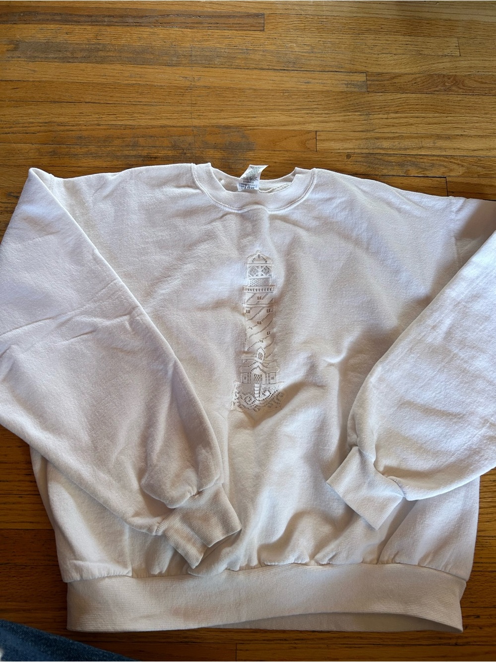 White Women's Crewneck Sweatshirt with Subtle Embroidered lighthouse  Design